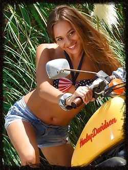 Dominika A looks stunning naked on a motorcycle